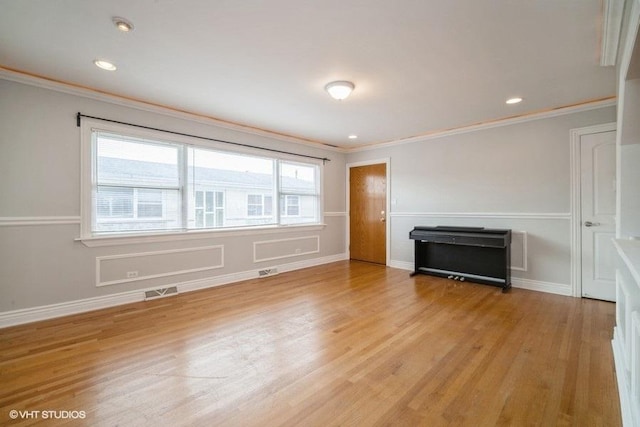 8610 W Summerdale Ave Unit 3N, Chicago, IL 60656 - unfurnished living room with ornamental molding, light wood-style flooring, and recessed lighting