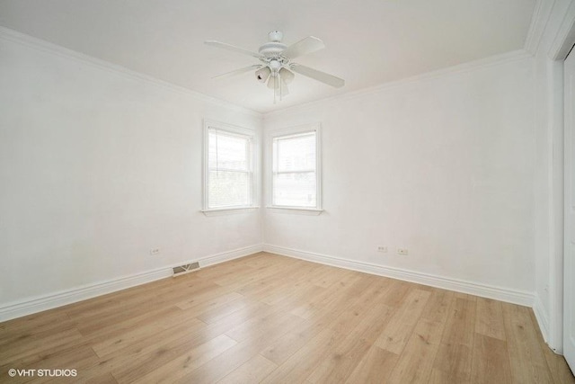8610 W Summerdale Ave Unit 3N, Chicago, IL 60656 - unfurnished room with light wood finished floors, ceiling fan, and crown molding