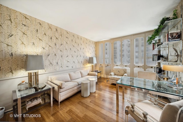 1300 N Lake Shore Dr Unit 18D, Chicago, IL 60610 - living room featuring wallpapered walls and wood finished floors