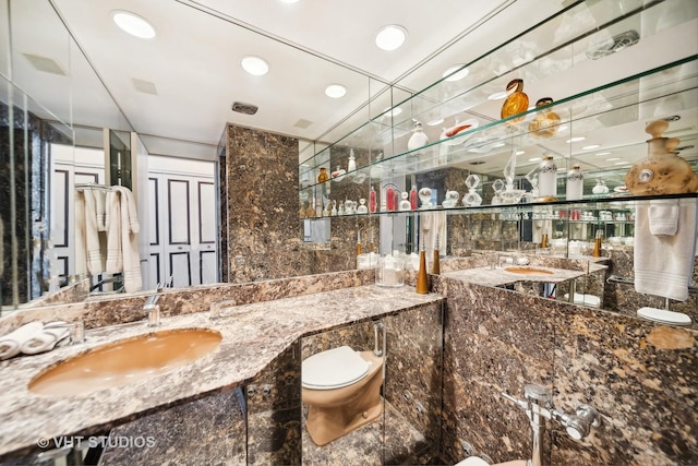 1300 N Lake Shore Dr Unit 18D, Chicago, IL 60610 - bathroom with toilet, vanity, and recessed lighting