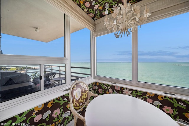 1300 N Lake Shore Dr Unit 18D, Chicago, IL 60610 - sunroom / solarium featuring a chandelier, a water view, and plenty of natural light