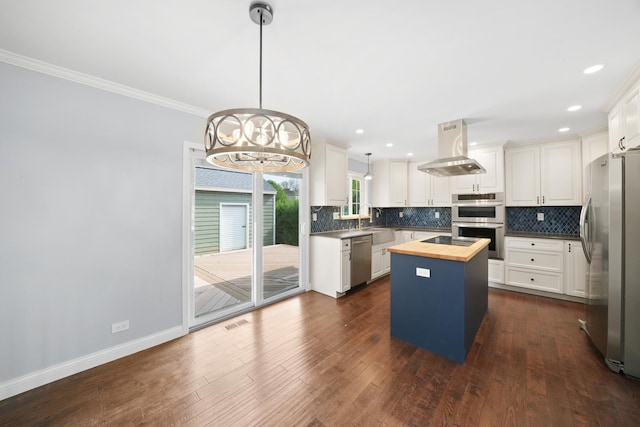 1012 Concord Dr, Bartlett, IL 60103 - kitchen featuring butcher block counters, island range hood, stainless steel appliances, a center island, and backsplash
