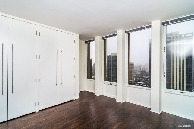 100 E Walton St Unit 22H, Chicago, IL 60611 - full bathroom with toilet, vanity, and a shower