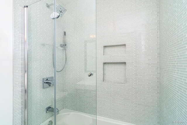 100 E Walton St Unit 22H, Chicago, IL 60611 - full bath featuring shower / bath combination with glass door