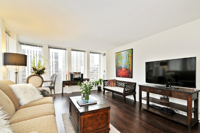 100 E Walton St Unit 22H, Chicago, IL 60611 - living room featuring wood finished floors