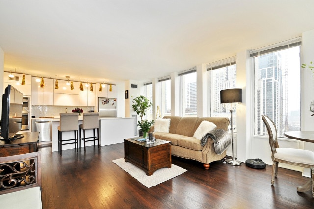 100 E Walton St Unit 22H, Chicago, IL 60611 - living area with dark wood-type flooring