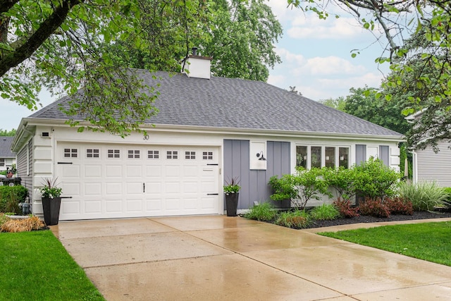 30 Beau Meade Rd, Oswego, IL 60543 - view of front of house with board and batten siding, a shingled roof, driveway, and a chimney