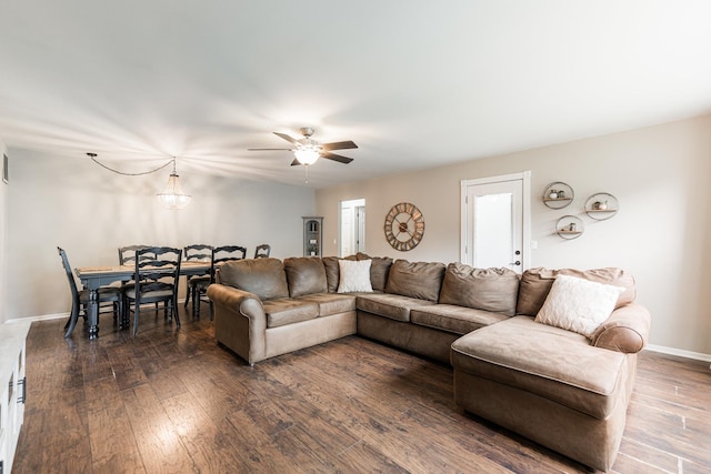 30 Beau Meade Rd, Oswego, IL 60543 - living room featuring dark wood-style floors, a ceiling fan, and baseboards