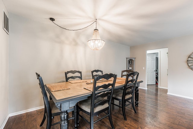 30 Beau Meade Rd, Oswego, IL 60543 - dining area featuring a chandelier, wood finished floors, and baseboards