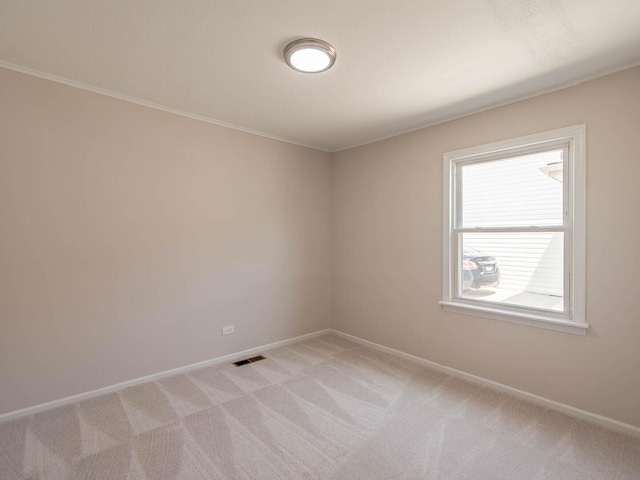 52 S Hawthorne Blvd, Mundelein, IL 60060 - unfurnished room with light carpet, baseboards, and ornamental molding