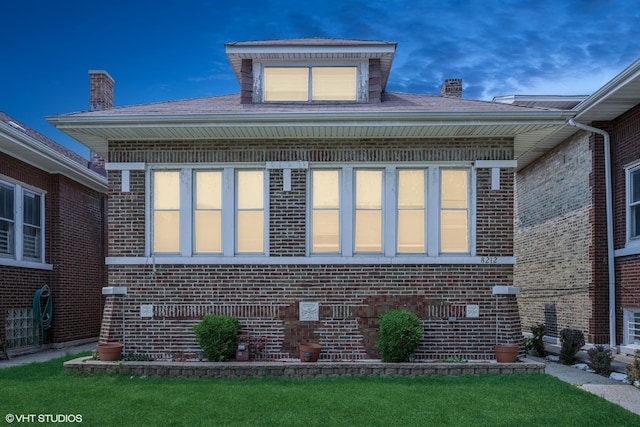 8212 S Bishop St, Chicago, IL 60620 - view of front facade with brick siding and a front yard
