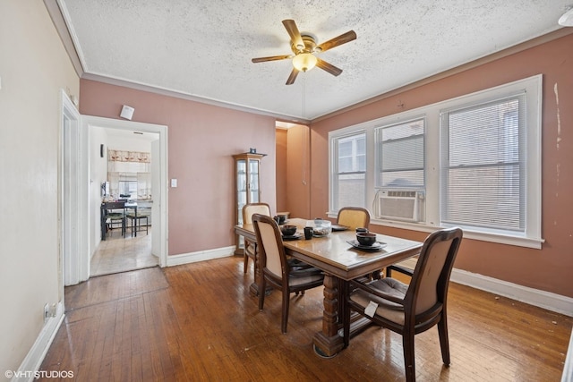 8212 S Bishop St, Chicago, IL 60620 - dining area with ceiling fan, a textured ceiling, hardwood / wood-style floors, cooling unit, and crown molding