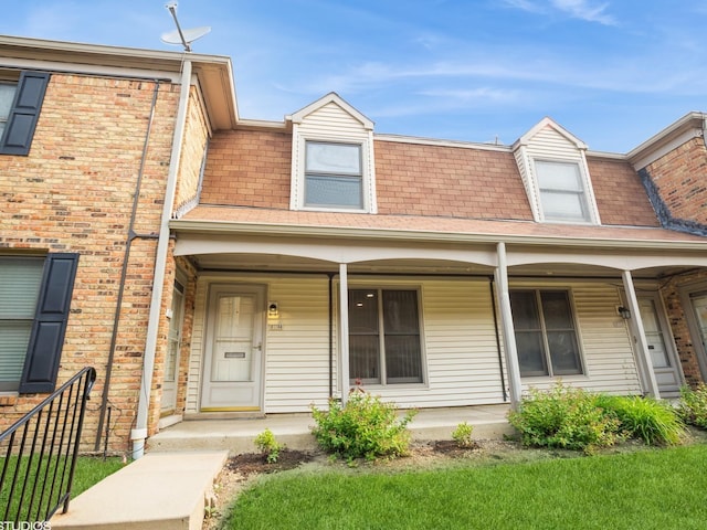 1812 Bristol Walk Unit 1812, Hoffman Estates, IL 60169 - view of front facade featuring covered porch, mansard roof, and roof with shingles