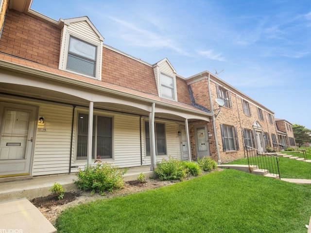 1812 Bristol Walk Unit 1812, Hoffman Estates, IL 60169 - multi unit property featuring a front yard, covered porch, mansard roof, and roof with shingles