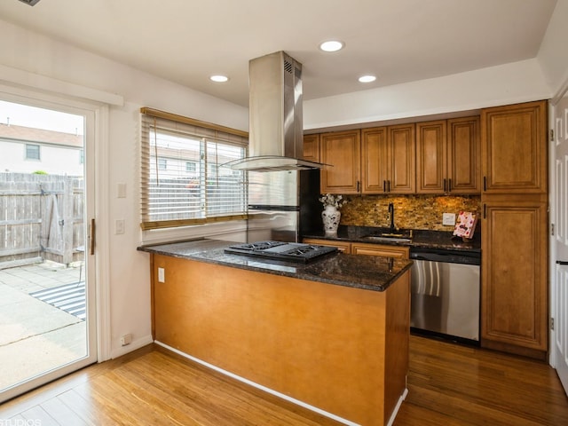 1812 Bristol Walk Unit 1812, Hoffman Estates, IL 60169 - kitchen with dishwasher, island exhaust hood, gas cooktop, brown cabinets, and wood finished floors