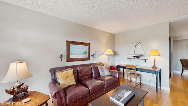 5400 Walnut Ave Unit 201, Downers Grove, IL 60515 - living area featuring hardwood / wood-style flooring and a textured ceiling