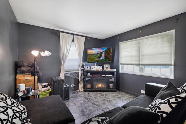17715 Roy St, Lansing, IL 60438 - living area with baseboards and a warm lit fireplace