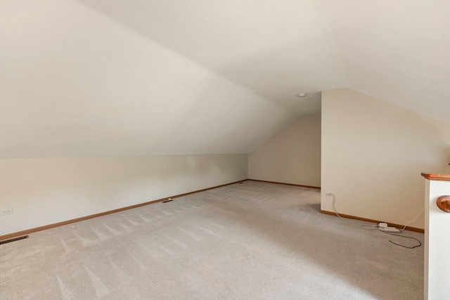 3072 Carlton Ct, Westchester, IL 60154 - additional living space with lofted ceiling and carpet flooring
