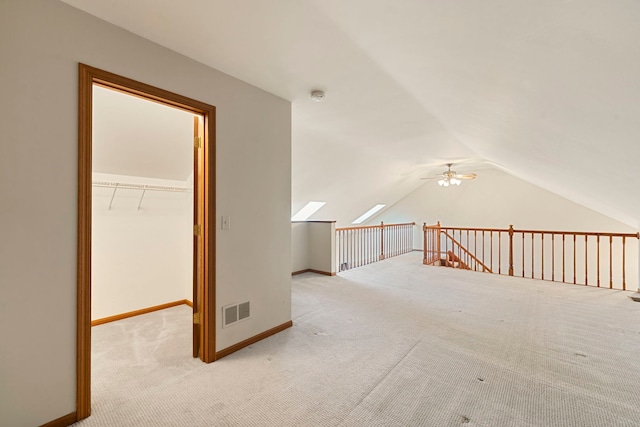 3072 Carlton Ct, Westchester, IL 60154 - additional living space with carpet floors, vaulted ceiling, and ceiling fan