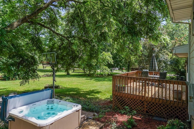 8524 Carriage Hills Rd, Bloomington, IL 61705 - view of green lawn with a hot tub and a wooden deck