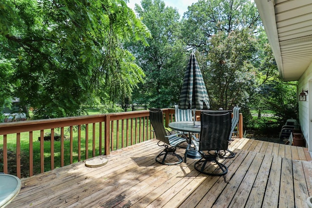 8524 Carriage Hills Rd, Bloomington, IL 61705 - wooden terrace featuring outdoor dining space and a yard
