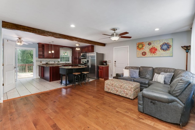 8524 Carriage Hills Rd, Bloomington, IL 61705 - living room with light wood-style floors, a ceiling fan, beam ceiling, and recessed lighting