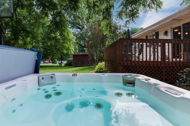 8524 Carriage Hills Rd, Bloomington, IL 61705 - view of swimming pool featuring a hot tub and a deck