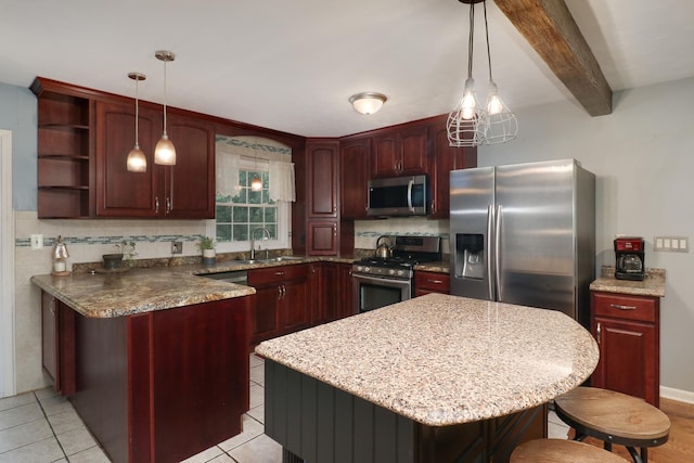 8524 Carriage Hills Rd, Bloomington, IL 61705 - kitchen with appliances with stainless steel finishes, a peninsula, a kitchen bar, dark brown cabinets, and decorative backsplash