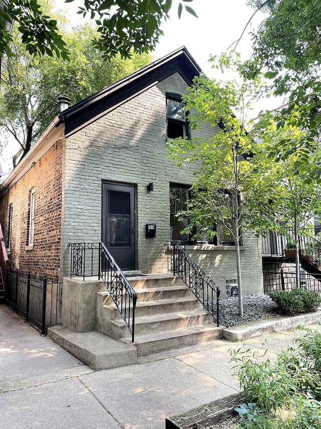 2040 W Shakespeare Ave, Chicago, IL 60647 - view of front facade with brick siding
