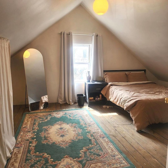 2040 W Shakespeare Ave, Chicago, IL 60647 - bedroom with hardwood / wood-style floors, lofted ceiling, and arched walkways
