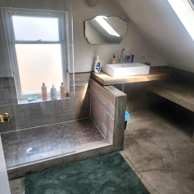 2040 W Shakespeare Ave, Chicago, IL 60647 - bathroom featuring a sink, a stall shower, and vaulted ceiling