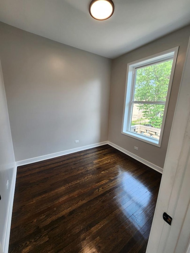 1332 S Lawndale Ave, Chicago, IL 60623 - unfurnished living room featuring dark wood finished floors and recessed lighting