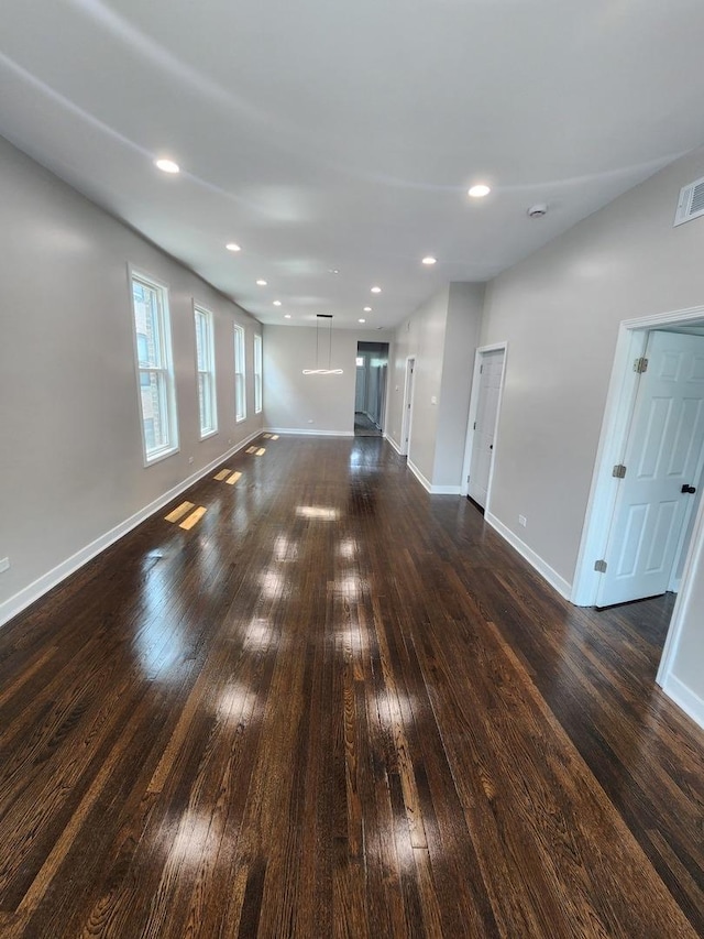 1332 S Lawndale Ave, Chicago, IL 60623 - unfurnished bedroom featuring dark wood finished floors and a closet