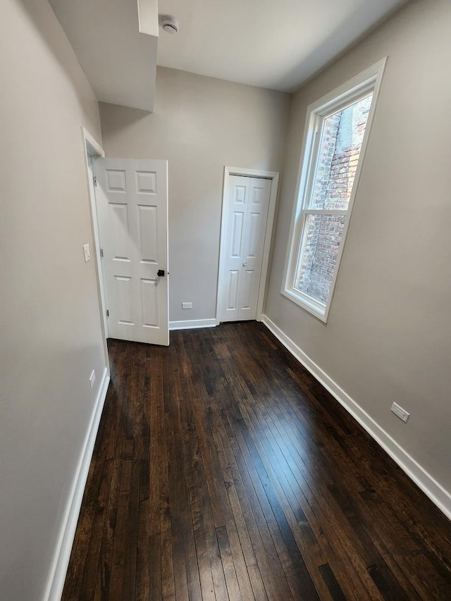 1332 S Lawndale Ave, Chicago, IL 60623 - kitchen with white cabinets, wood finished floors, tasteful backsplash, and light countertops