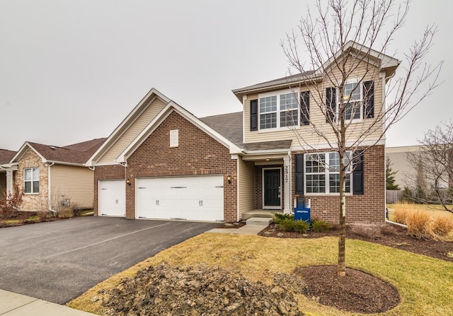 23426 W Lansdowne Rd, Plainfield, IL 60585 - traditional home featuring brick siding, an attached garage, asphalt driveway, a front yard, and a shingled roof