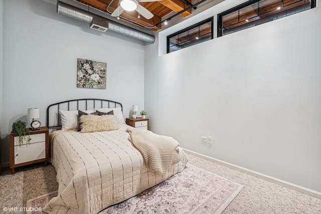 1735 W Diversey Pkwy Unit 402, Chicago, IL 60614 - carpeted bedroom with baseboards, a high ceiling, and ceiling fan