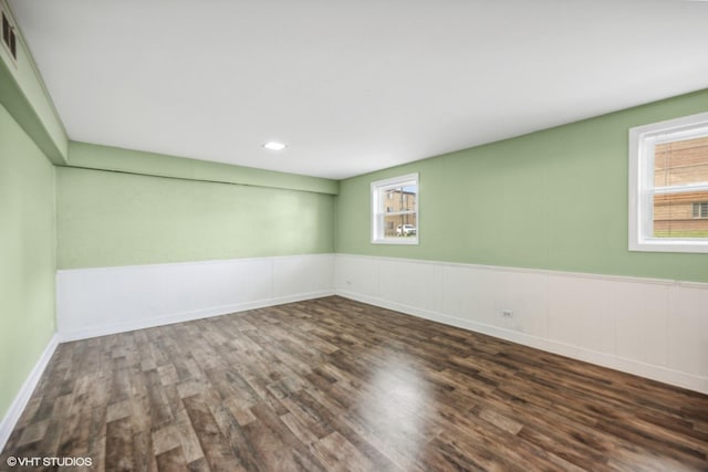 803 W Miner St, Arlington Heights, IL 60005 - spare room featuring wood finished floors, healthy amount of natural light, a wainscoted wall, and recessed lighting