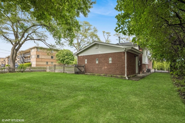 803 W Miner St, Arlington Heights, IL 60005 - rear view of property featuring brick siding and central AC unit