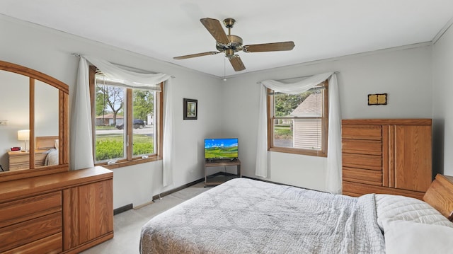 540 W Madison St, Lombard, IL 60148 - bedroom with light carpet, ornamental molding, baseboards, and ceiling fan
