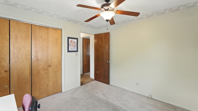540 W Madison St, Lombard, IL 60148 - unfurnished bedroom with a closet, carpet flooring, baseboards, and ceiling fan
