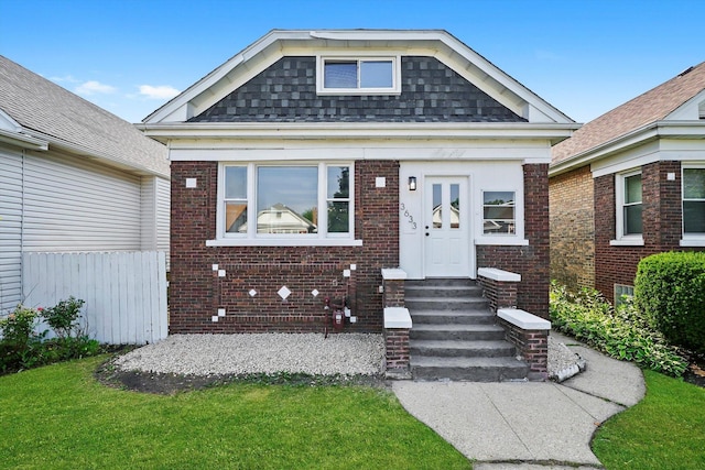 3633 N Lotus Ave, Chicago, IL 60641 - view of front facade featuring entry steps and brick siding