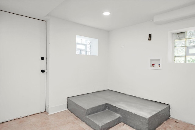 3633 N Lotus Ave, Chicago, IL 60641 - washroom featuring healthy amount of natural light, washer hookup, recessed lighting, and light tile patterned floors