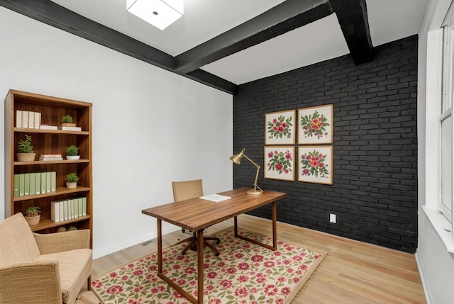 3633 N Lotus Ave, Chicago, IL 60641 - office area featuring brick wall, beamed ceiling, and wood finished floors