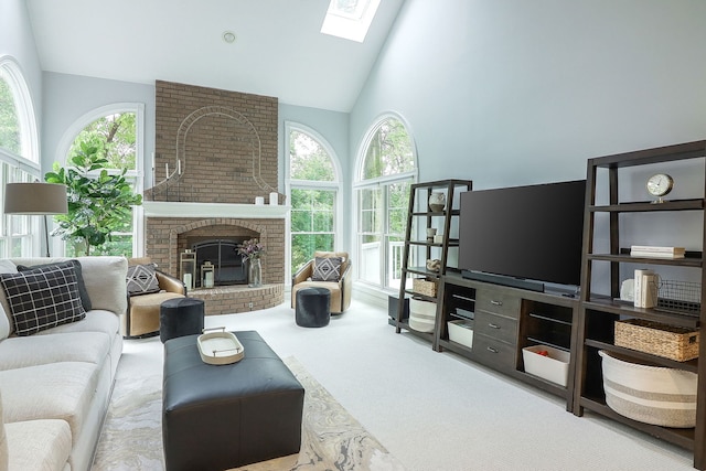 26W231 Tuckaway Ct, Winfield, IL 60190 - living area with plenty of natural light, a skylight, high vaulted ceiling, carpet floors, and a brick fireplace