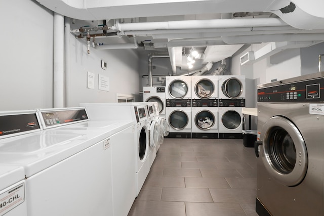 1550 N Lake Shore Dr Unit 9F, Chicago, IL 60610 - community laundry room featuring washing machine and dryer, stacked washer and clothes dryer, and tile patterned floors
