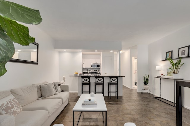 1550 N Lake Shore Dr Unit 9F, Chicago, IL 60610 - living room with baseboards and dark stone finish flooring