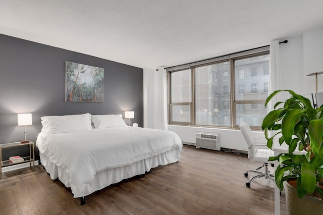 1550 N Lake Shore Dr Unit 9F, Chicago, IL 60610 - bedroom with hardwood / wood-style flooring and a wall unit AC