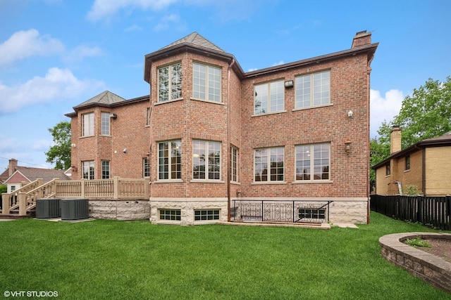 3832 W Chase Ave, Lincolnwood, IL 60712 - back of house with brick siding and a chimney