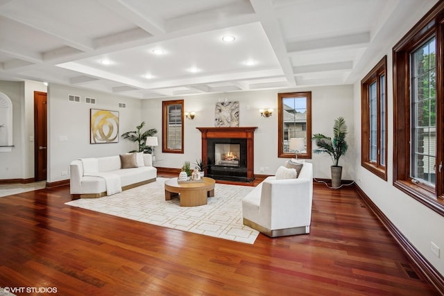 3832 W Chase Ave, Lincolnwood, IL 60712 - living area with coffered ceiling, wood finished floors, a fireplace with flush hearth, beamed ceiling, and recessed lighting