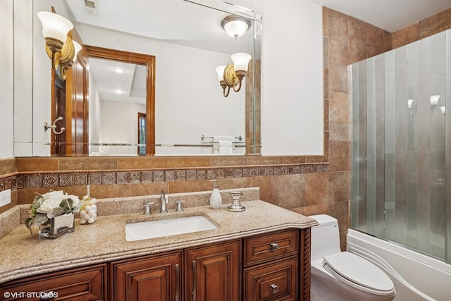 3832 W Chase Ave, Lincolnwood, IL 60712 - full bathroom featuring tile walls, vanity, enclosed tub / shower combo, and backsplash